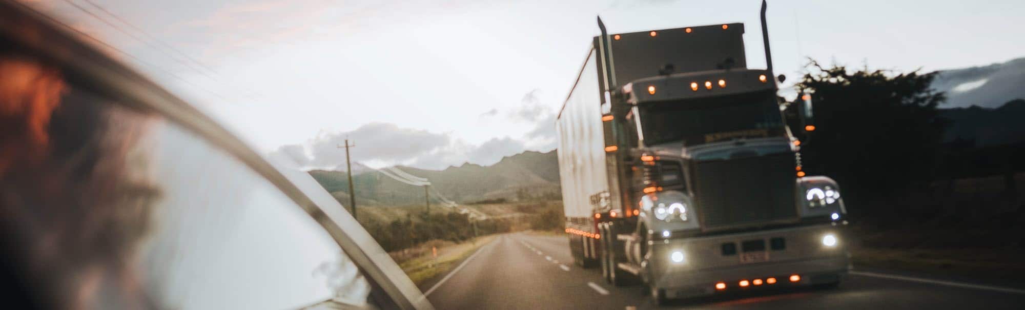 photo of 18 wheeler in drivers blind spot